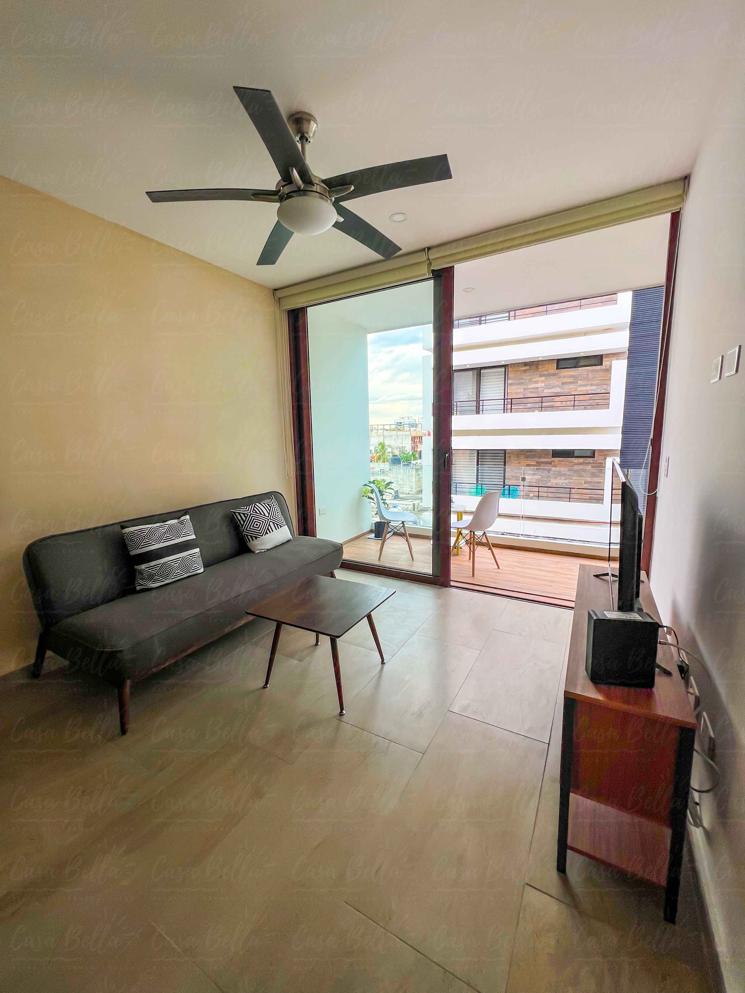 Living room with sofa provides one extra sleeping space